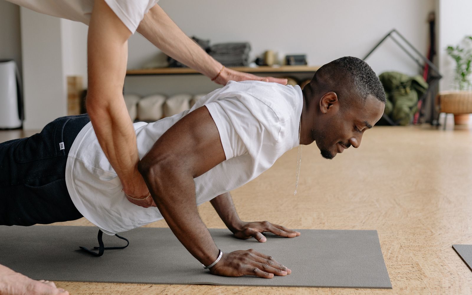 Professional wellness consultation discussing spinal health and movement