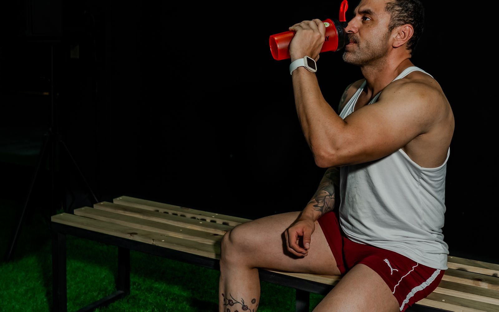 Coach guiding a thoughtful strength exercise